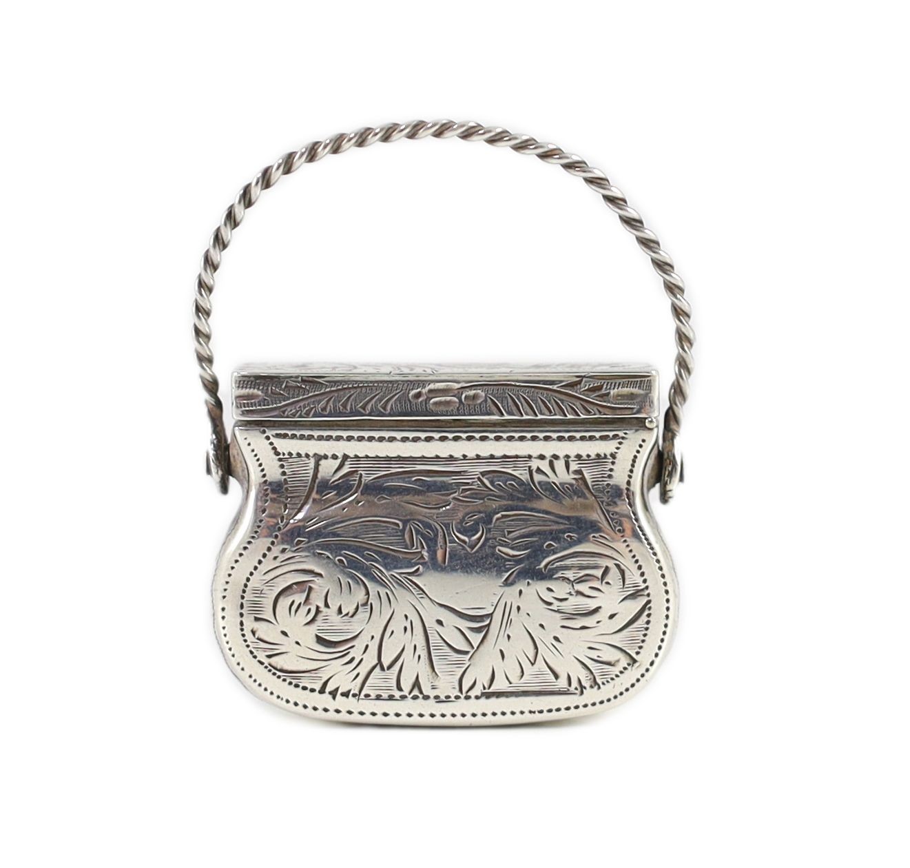 A George IV engraved silver vinaigrette, modelled as a handbag, by Gervase Wheeler